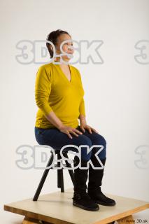 Sitting reference of yellow sweater blue jeans Gwendolyn 0006